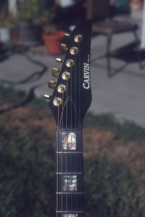 Closeup of headstock and first few frets